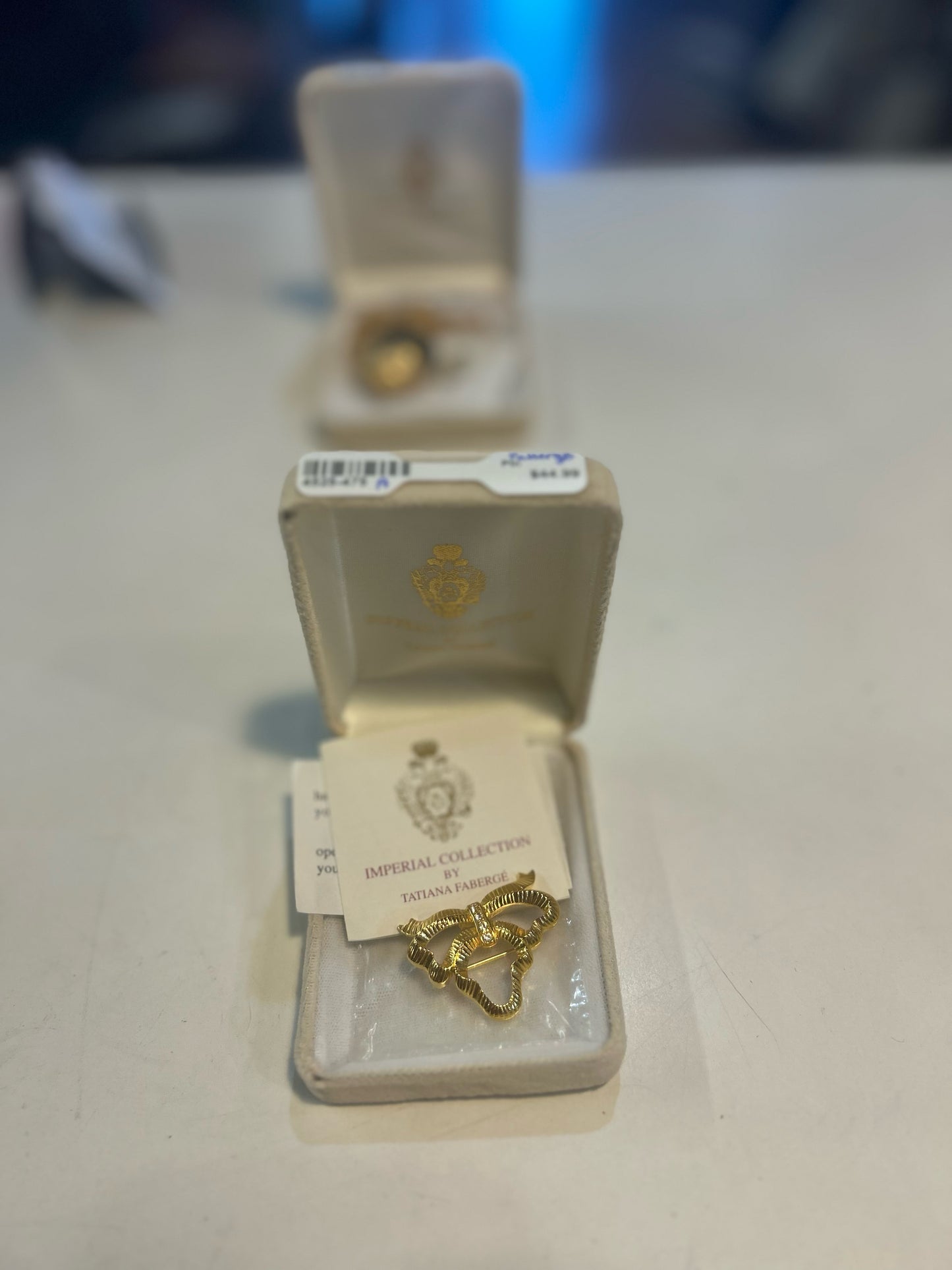 Tatiana Faberge "Bow Charm Holder" Pin