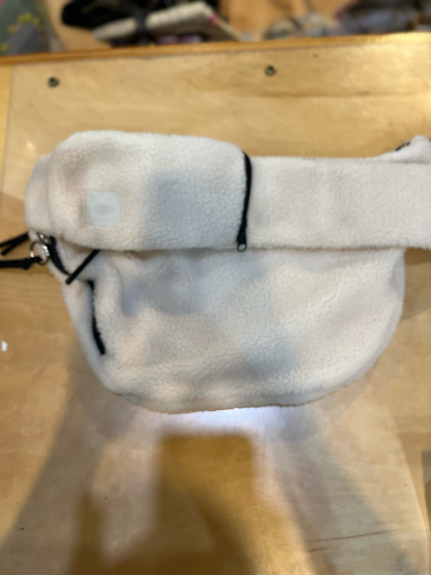 Free People “Overachiever Cream Sherpa Sling” Handbag
