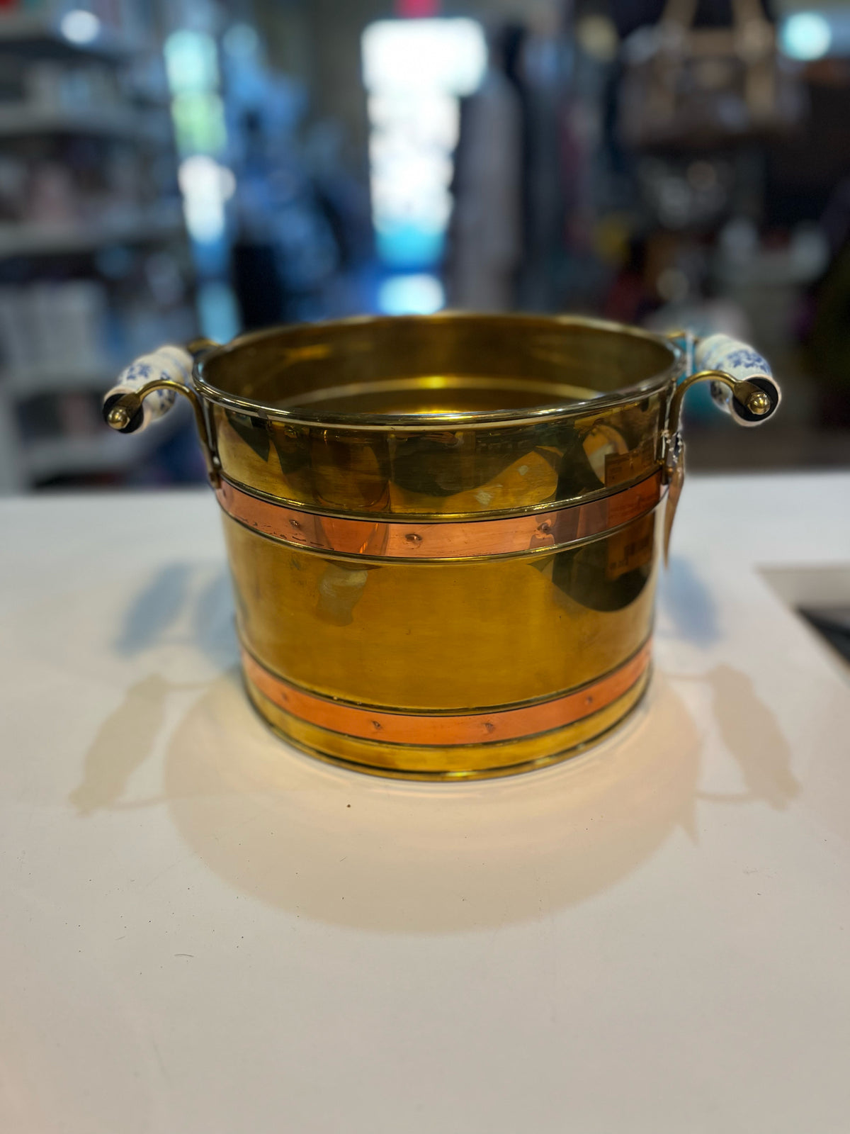 Vintage large copper and brass pail bucket with porcelain handle lion heads