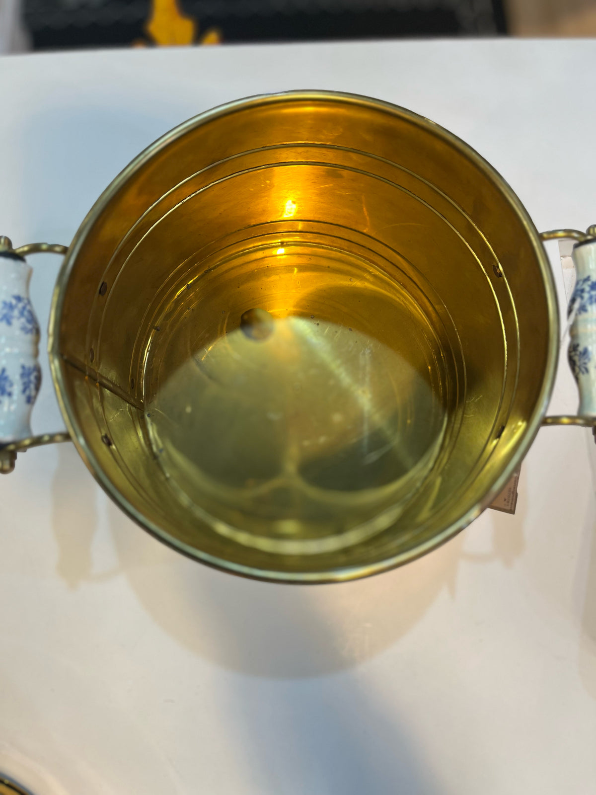 Vintage large copper and brass pail bucket with porcelain handle lion heads