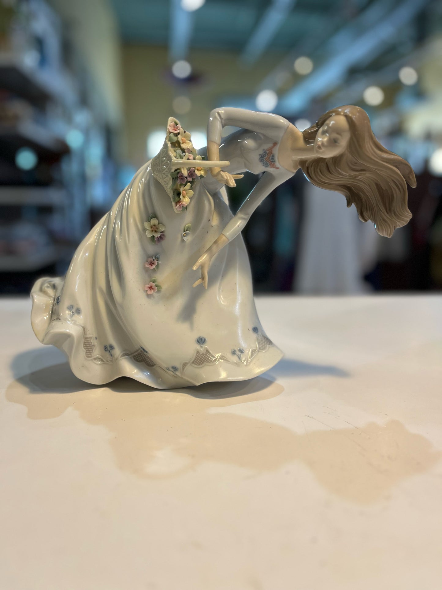 Lladro "Petals on the Wind" Figurine