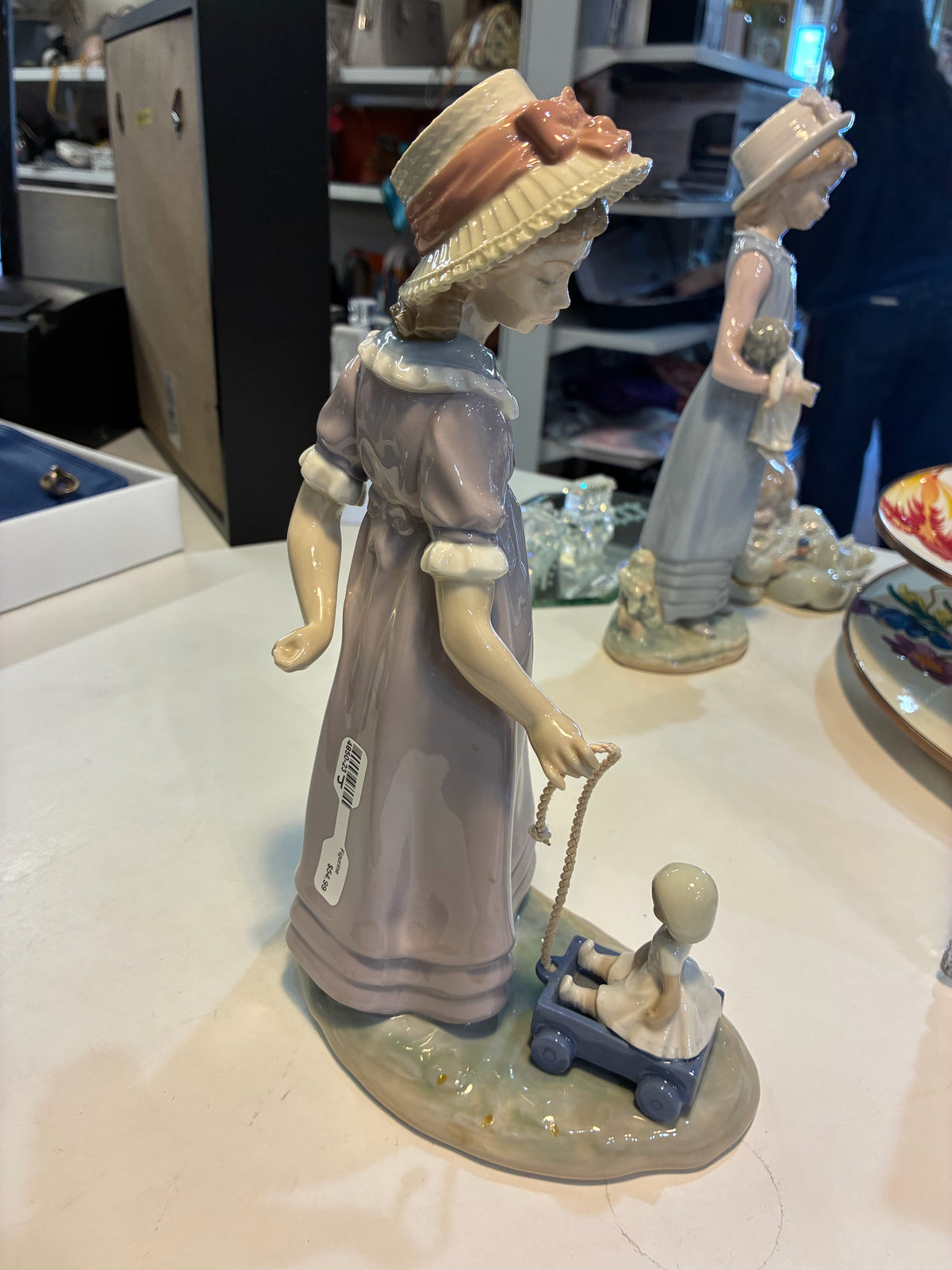 Lladro #5044 "Girl with Toy Wagon/Pulling Doll"
